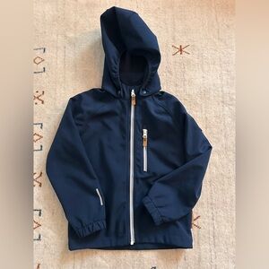Boys Reima softshell jacket in blue, size 116.